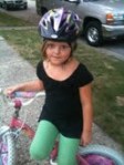 When I told Maria I was going to take her picture, she jumped off her bike and got in this pose!