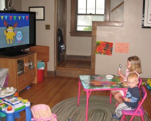 Maria learning how to be the "mother hen" early!